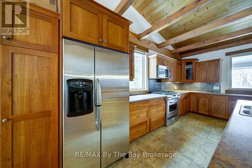 Custom Cherry Wood Cabinetry - 397 Silver Birch Drive, Tiny, ON - Indoor Photo Showing Kitchen