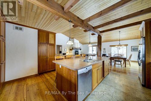 Center Island - 397 Silver Birch Drive, Tiny, ON - Indoor Photo Showing Kitchen With Double Sink