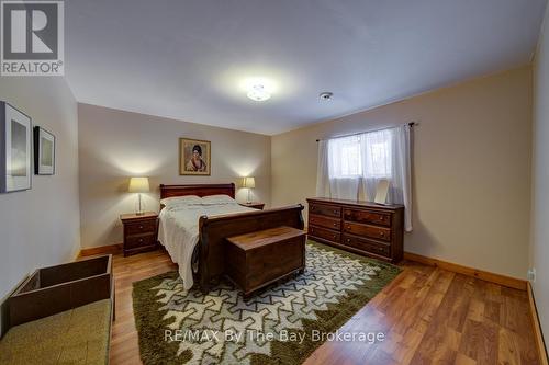Large Second Bedroom - 397 Silver Birch Drive, Tiny, ON - Indoor Photo Showing Bedroom