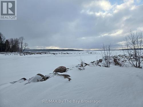 View from Lake access (Winter) - 397 Silver Birch Drive, Tiny, ON - Outdoor With Body Of Water With View