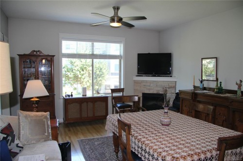 207-2117 Meredith Rd, Nanaimo, BC - Indoor Photo Showing Dining Room With Fireplace