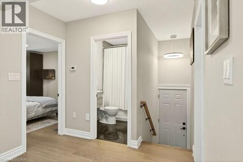 Hallway featuring light wood-style floors and an upstairs landing - 237 East 32Nd Street, Hamilton, ON - Indoor Photo Showing Other Room