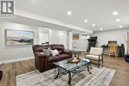 Living room with wood finished floors, recessed lighting, and an office area - 237 East 32Nd Street, Hamilton, ON - Indoor Photo Showing Living Room