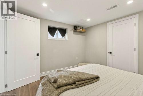 Bedroom featuring dark wood-style floors and recessed lighting - 237 East 32Nd Street, Hamilton, ON - Indoor