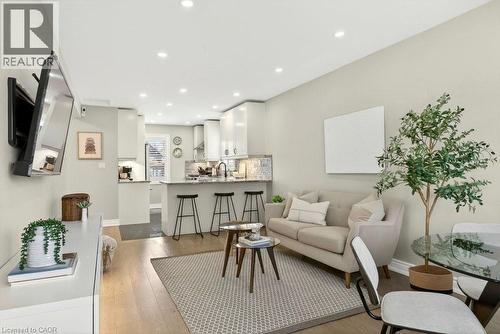 Living room featuring light wood-style floors and recessed lighting - 237 East 32Nd Street, Hamilton, ON - Indoor Photo Showing Living Room