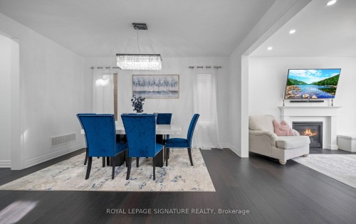 474 Violet Gate, Milton, ON - Indoor Photo Showing Dining Room With Fireplace