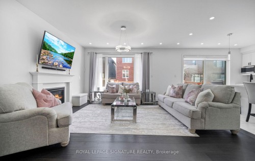 474 Violet Gate, Milton, ON - Indoor Photo Showing Living Room With Fireplace