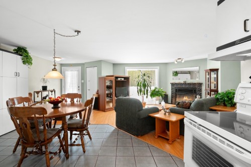 Vue d'ensemble - 1206 Av. Du Parc, Saint-Jérôme, QC - Indoor Photo Showing Dining Room With Fireplace