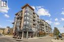 View of apartment building / complex - 40 Esplanade Lane Unit# 102, Grimsby, ON  - Outdoor With Facade 