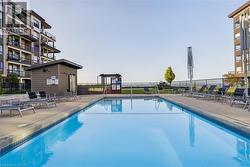 Community pool with a patio - 