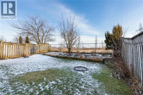 View of fenced backyard - 142 Hawkswood Trail, Hamilton, ON - Outdoor