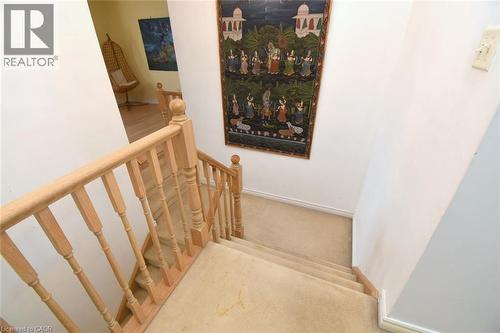 Staircase featuring carpet floors and baseboards - 142 Hawkswood Trail, Hamilton, ON - Indoor Photo Showing Other Room
