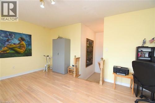 Office area featuring light wood finished floors and baseboards - 142 Hawkswood Trail, Hamilton, ON - Indoor