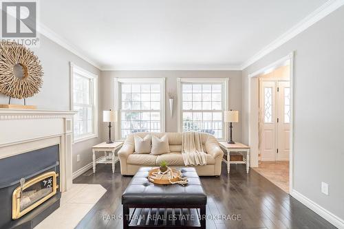5 Bailey Crescent, Tiny, ON - Indoor Photo Showing Living Room With Fireplace