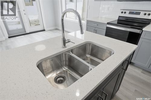 262 Kostiuk Crescent, Saskatoon, SK - Indoor Photo Showing Kitchen With Double Sink