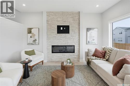 266 Kostiuk Crescent, Saskatoon, SK - Indoor Photo Showing Living Room With Fireplace