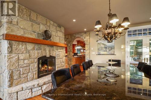 190 Melissa Lane, Tiny, ON - Indoor Photo Showing Dining Room With Fireplace