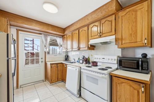 Kitchen - 3737 Boul. Henri-Bourassa O., Montréal (Saint-Laurent), QC - Indoor Photo Showing Kitchen With Double Sink