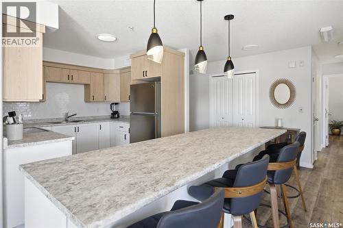 203 914 Heritage View, Saskatoon, SK - Indoor Photo Showing Kitchen With Upgraded Kitchen
