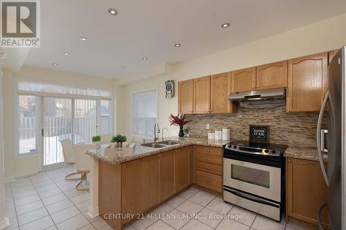 5869 Yachtsman Cross, Mississauga, ON - Indoor Photo Showing Kitchen With Double Sink