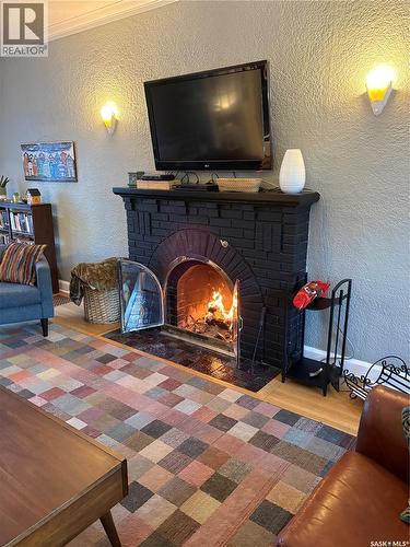 2620 Angus Boulevard, Regina, SK - Indoor Photo Showing Living Room With Fireplace