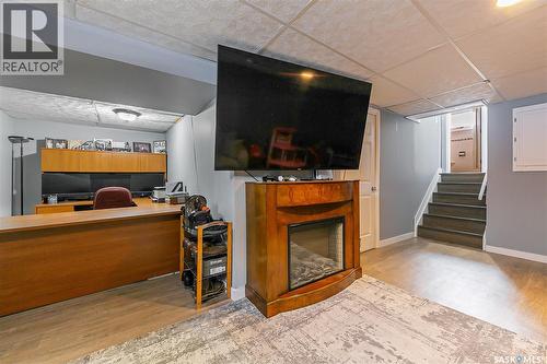 35 Cooper Crescent, Regina, SK - Indoor With Fireplace