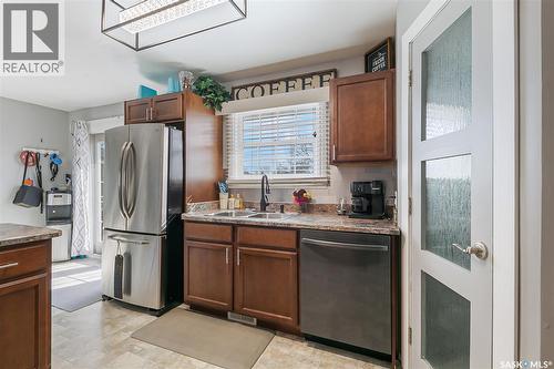 35 Cooper Crescent, Regina, SK - Indoor Photo Showing Kitchen With Double Sink