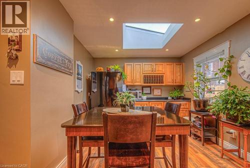 Dining space with a skylight, light wood-type flooring, and recessed lighting - 81 Beechwood Avenue, Hamilton, ON - Indoor Photo Showing Dining Room