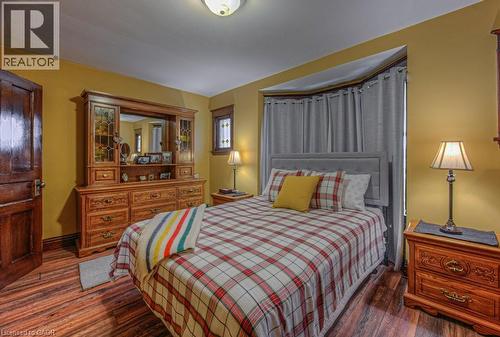 Bedroom with dark wood-style floors - 81 Beechwood Avenue, Hamilton, ON - Indoor Photo Showing Bedroom