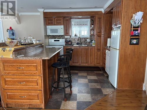 11 Lamage Point Road, St Anthony, NL - Indoor Photo Showing Kitchen With Double Sink