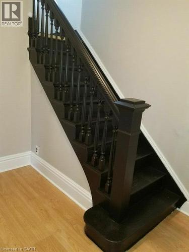 Stairway featuring wood finished floors - 170 Stewartdale Avenue, Hamilton, ON - Indoor Photo Showing Other Room