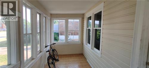 Sunroom / solarium with parquet floors - 170 Stewartdale Avenue, Hamilton, ON - Indoor Photo Showing Other Room