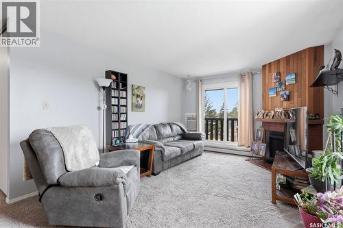 1031 425 115Th Street E, Saskatoon, SK - Indoor Photo Showing Living Room With Fireplace