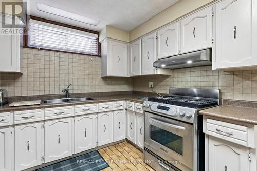 1400 Bough Beeches Boulevard, Mississauga, ON - Indoor Photo Showing Kitchen With Double Sink