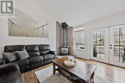 158 Desroches Trail, Tiny, ON - Indoor Photo Showing Living Room With Fireplace
