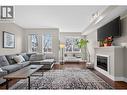 433 Mccarren Avenue Unit# 9, Kelowna, BC  - Indoor Photo Showing Living Room With Fireplace 