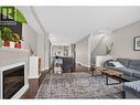 433 Mccarren Avenue Unit# 9, Kelowna, BC  - Indoor Photo Showing Living Room With Fireplace 