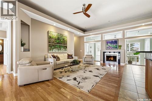 3270 Windsor Park Crescent, Regina, SK - Indoor Photo Showing Living Room With Fireplace