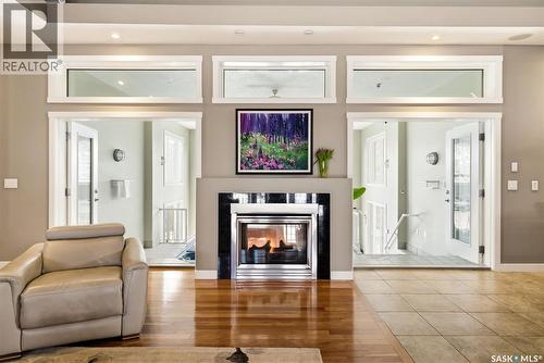 3270 Windsor Park Crescent, Regina, SK - Indoor Photo Showing Living Room With Fireplace