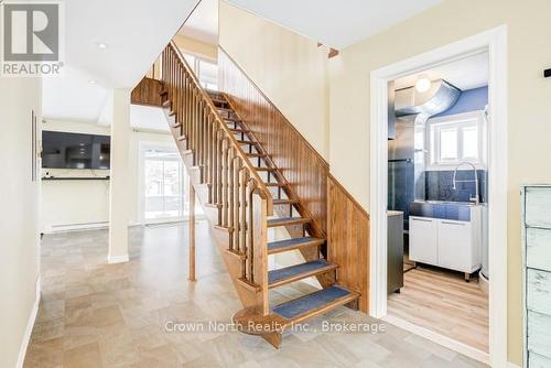 Solid Wood Staircase Open To Living Space - 39 Turtle Path, Ramara, ON - Indoor Photo Showing Other Room