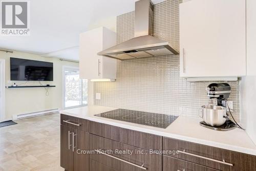 Renovated Kitchen with All Stainless Steel App - 39 Turtle Path, Ramara, ON - Indoor Photo Showing Kitchen With Upgraded Kitchen