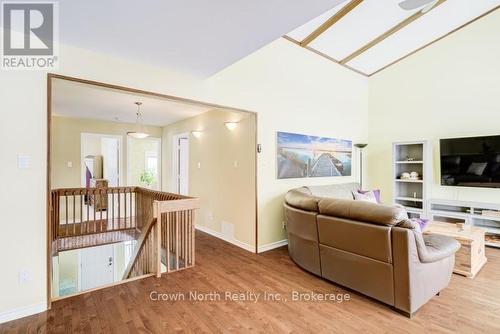 Upstairs living area with stairs and seating - 39 Turtle Path, Ramara, ON - Indoor