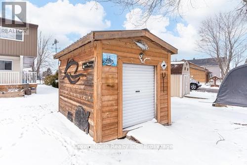 Wood shed with garage door and storage space - 39 Turtle Path, Ramara, ON - Outdoor