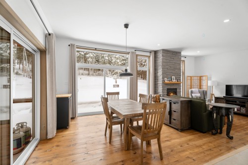 Dining Room - 1500 10E Rang, Val-David, QC - Indoor Photo Showing Dining Room With Fireplace