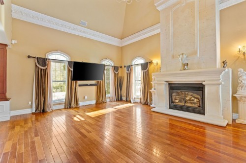 Living Room - 1185 Rue St-Andrews, Mascouche, QC - Indoor Photo Showing Living Room With Fireplace