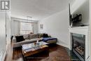 1896 Woodgate Court, Oshawa, ON  - Indoor Photo Showing Living Room With Fireplace 