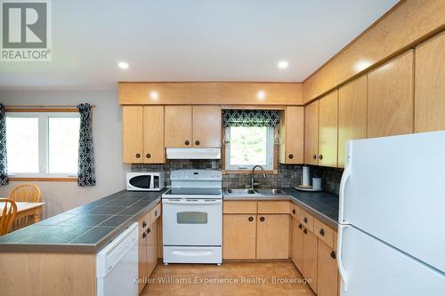 450 Concession 11 Road E, Tiny, ON - Indoor Photo Showing Kitchen With Double Sink