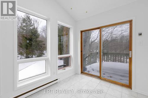 Sunroom With Walk-Out To Deck - 50 Concession Rd 2 W, Tiny, ON - Indoor Photo Showing Other Room