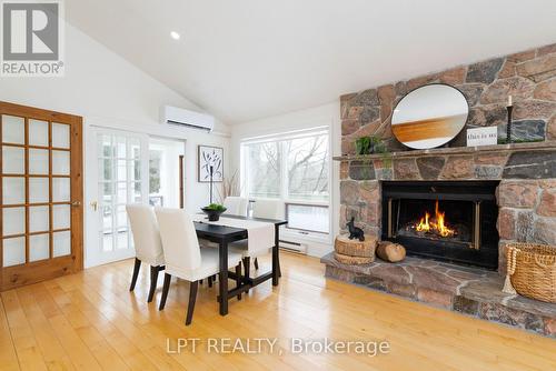 50 Concession Rd 2 W, Tiny, ON - Indoor With Fireplace