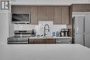 512 - 5 Chef Lane, Barrie, ON  - Indoor Photo Showing Kitchen With Double Sink 